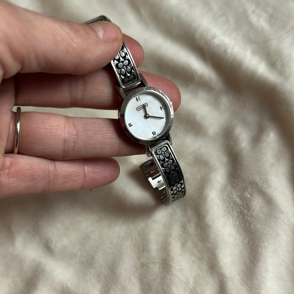 Coach Silver and black pattern bracelet watch